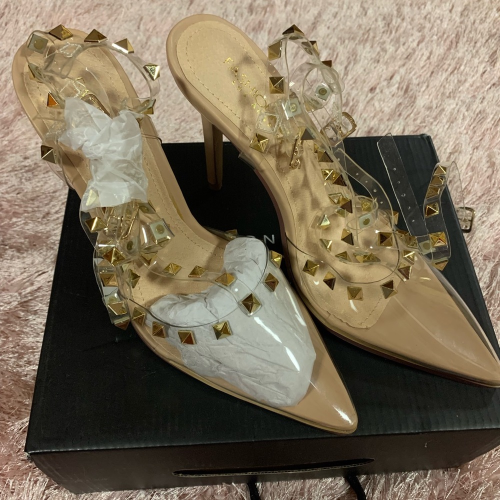 FN clear studded stiletto shoes.